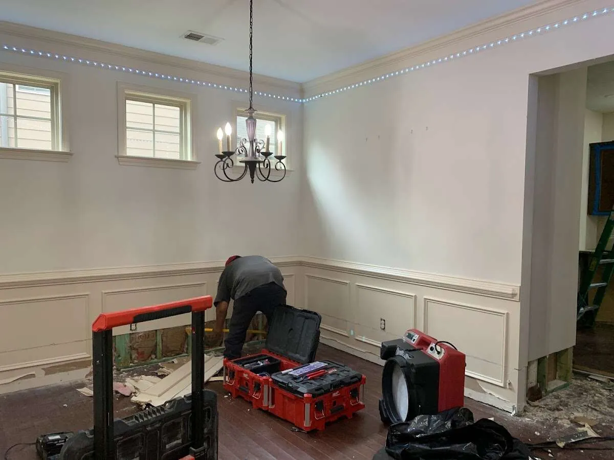 Restoration technician with professional equipment in Washingtonville